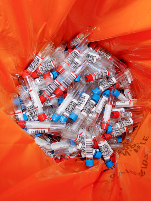 Plastic medical waste bin with phials